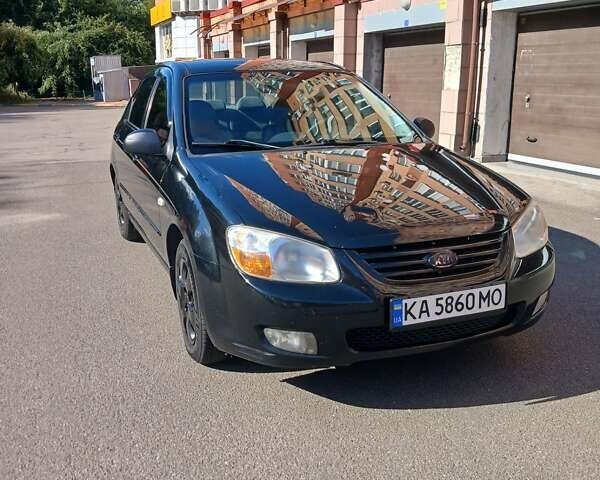 Черный Киа Черато, объемом двигателя 1.6 л и пробегом 291 тыс. км за 3750 $, фото 1 на Automoto.ua