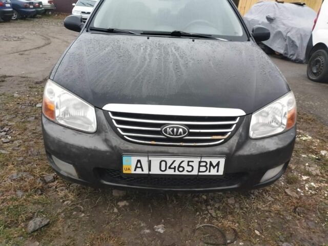 Черный Киа Черато, объемом двигателя 2 л и пробегом 380 тыс. км за 3600 $, фото 1 на Automoto.ua