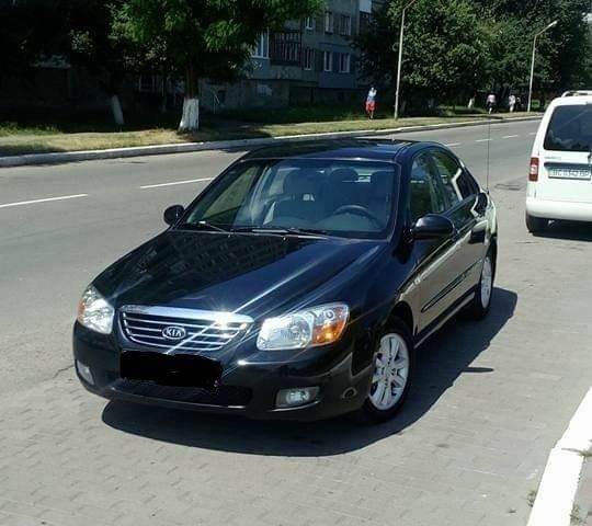 Черный Киа Черато, объемом двигателя 2 л и пробегом 240 тыс. км за 4700 $, фото 1 на Automoto.ua