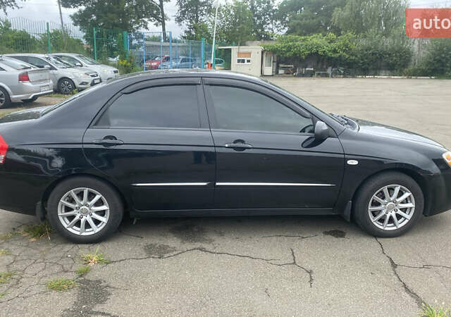 Чорний Кіа Черато, об'ємом двигуна 1.59 л та пробігом 280 тис. км за 6200 $, фото 1 на Automoto.ua