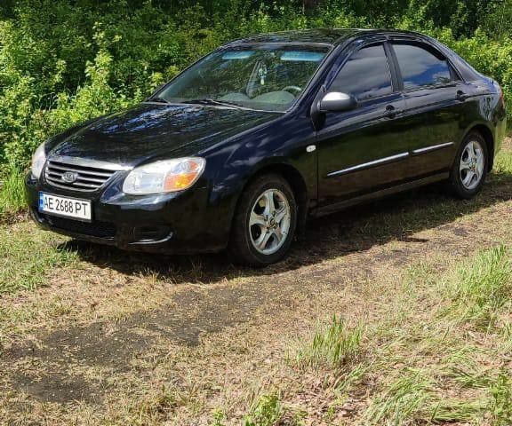 Черный Киа Черато, объемом двигателя 1.6 л и пробегом 278 тыс. км за 4350 $, фото 1 на Automoto.ua