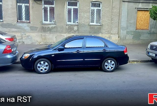 Черный Киа Черато, объемом двигателя 1.6 л и пробегом 100 тыс. км за 5000 $, фото 1 на Automoto.ua