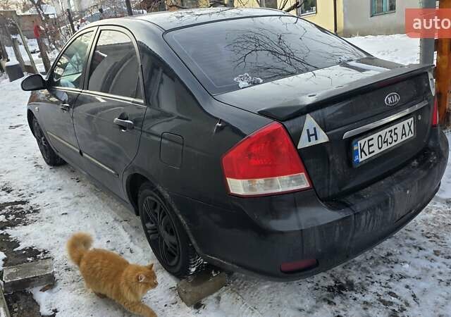Черный Киа Черато, объемом двигателя 1.6 л и пробегом 236 тыс. км за 4100 $, фото 1 на Automoto.ua