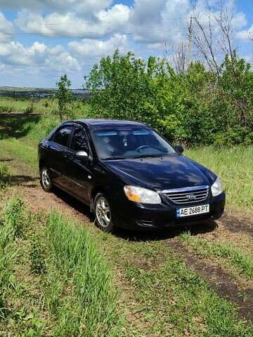 Черный Киа Черато, объемом двигателя 1.59 л и пробегом 273 тыс. км за 4200 $, фото 1 на Automoto.ua