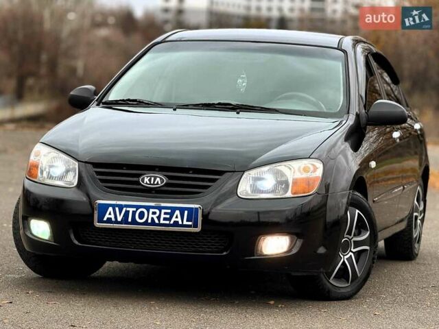 Чорний Кіа Черато, об'ємом двигуна 1.6 л та пробігом 224 тис. км за 4900 $, фото 1 на Automoto.ua