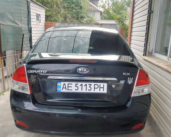 Чорний Кіа Черато, об'ємом двигуна 1.59 л та пробігом 255 тис. км за 5000 $, фото 1 на Automoto.ua