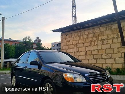 Черный Киа Черато, объемом двигателя 1.6 л и пробегом 185 тыс. км за 4200 $, фото 1 на Automoto.ua