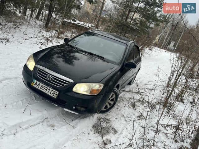 Черный Киа Черато, объемом двигателя 1.59 л и пробегом 243 тыс. км за 2900 $, фото 1 на Automoto.ua