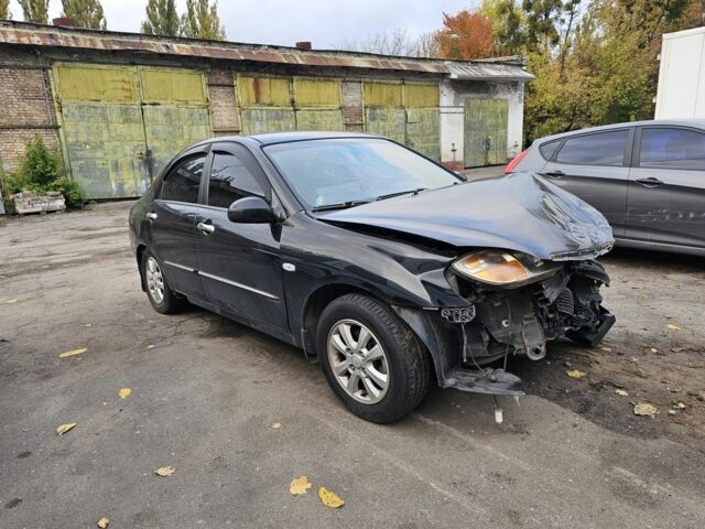 Чорний Кіа Черато, об'ємом двигуна 1.6 л та пробігом 200 тис. км за 1350 $, фото 1 на Automoto.ua