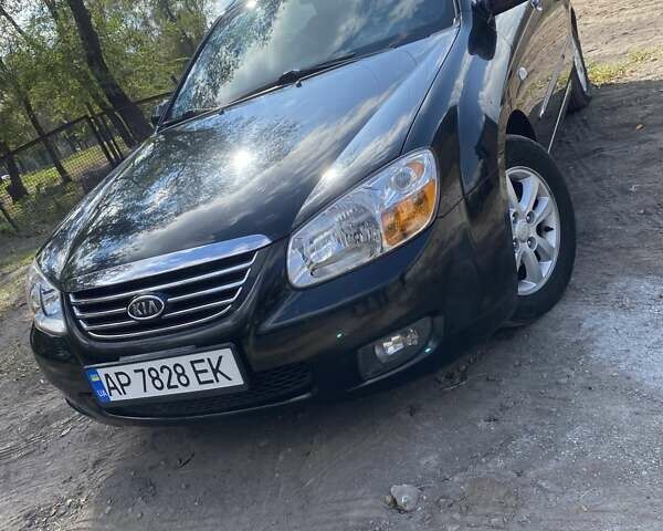 Чорний Кіа Черато, об'ємом двигуна 1.6 л та пробігом 157 тис. км за 5800 $, фото 1 на Automoto.ua