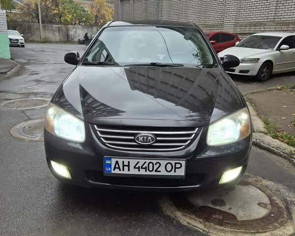 Черный Киа Черато, объемом двигателя 1.98 л и пробегом 180 тыс. км за 4500 $, фото 1 на Automoto.ua