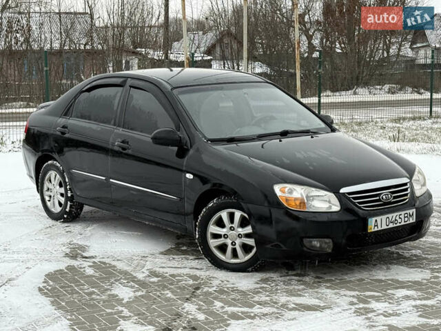 Чорний Кіа Черато, об'ємом двигуна 2 л та пробігом 258 тис. км за 2900 $, фото 1 на Automoto.ua