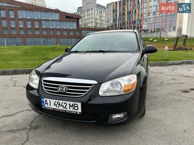 Черный Киа Черато, объемом двигателя 1.6 л и пробегом 232 тыс. км за 3850 $, фото 1 на Automoto.ua