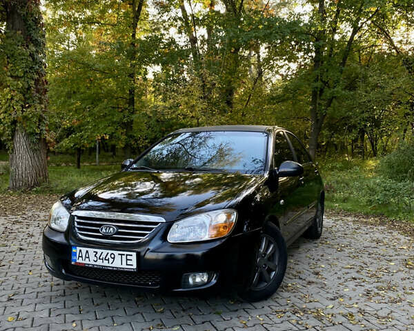Чорний Кіа Черато, об'ємом двигуна 1.98 л та пробігом 302 тис. км за 4700 $, фото 1 на Automoto.ua