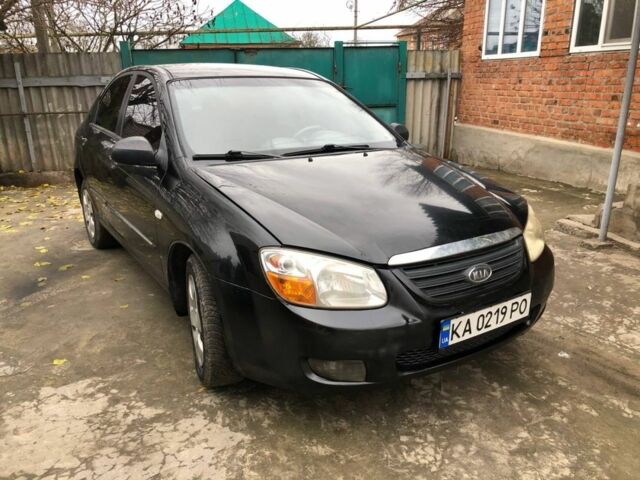 Черный Киа Черато, объемом двигателя 1.6 л и пробегом 240 тыс. км за 3300 $, фото 1 на Automoto.ua
