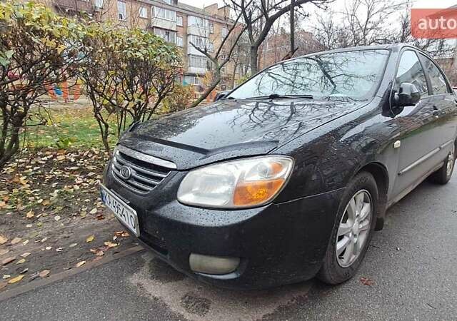 Черный Киа Черато, объемом двигателя 1.59 л и пробегом 349 тыс. км за 4000 $, фото 1 на Automoto.ua