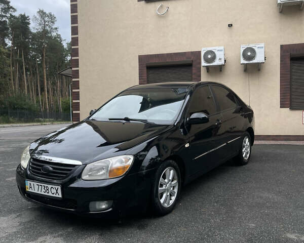 Черный Киа Черато, объемом двигателя 1.6 л и пробегом 211 тыс. км за 3200 $, фото 1 на Automoto.ua