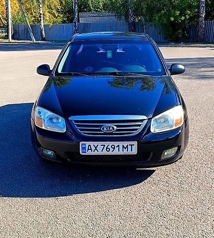 Черный Киа Черато, объемом двигателя 1.6 л и пробегом 291 тыс. км за 3700 $, фото 1 на Automoto.ua