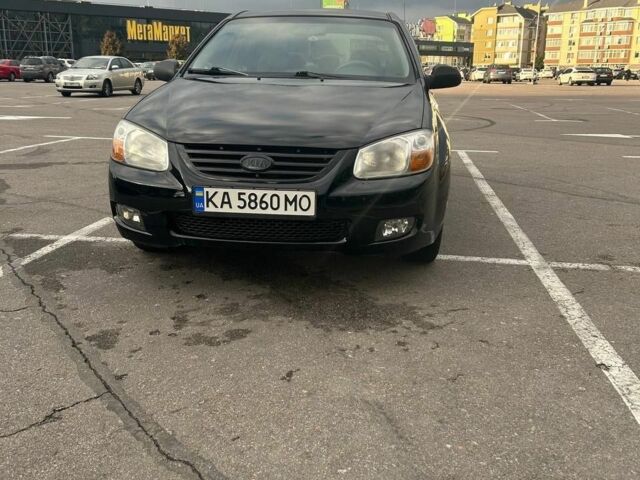 Черный Киа Черато, объемом двигателя 1.6 л и пробегом 292 тыс. км за 4000 $, фото 1 на Automoto.ua