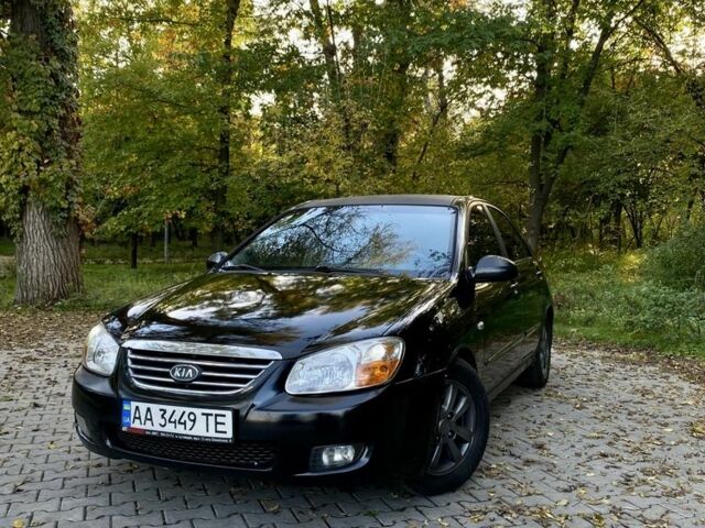 Черный Киа Черато, объемом двигателя 2 л и пробегом 302 тыс. км за 4600 $, фото 1 на Automoto.ua