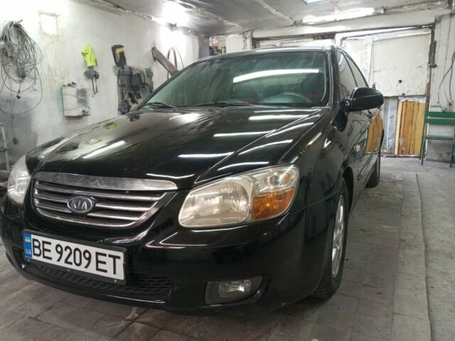 Черный Киа Черато, объемом двигателя 1.6 л и пробегом 300 тыс. км за 3500 $, фото 1 на Automoto.ua