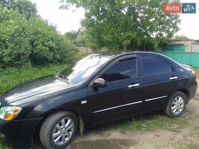Чорний Кіа Черато, об'ємом двигуна 2 л та пробігом 310 тис. км за 4000 $, фото 1 на Automoto.ua
