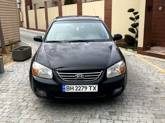 Черный Киа Черато, объемом двигателя 2 л и пробегом 357 тыс. км за 3200 $, фото 1 на Automoto.ua
