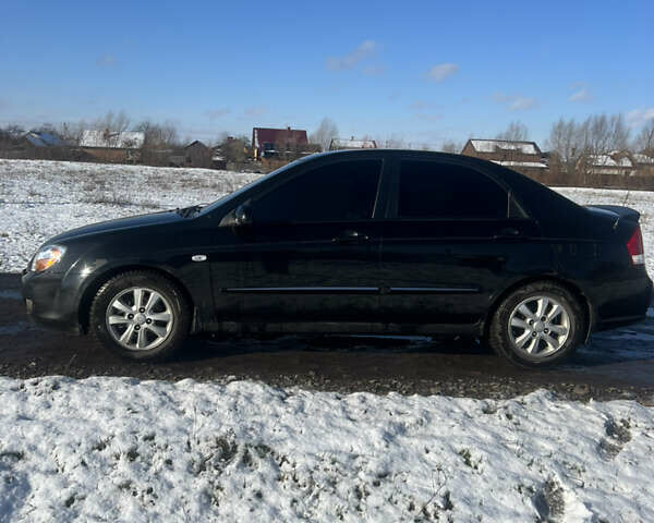 Черный Киа Черато, объемом двигателя 1.58 л и пробегом 355 тыс. км за 3500 $, фото 1 на Automoto.ua