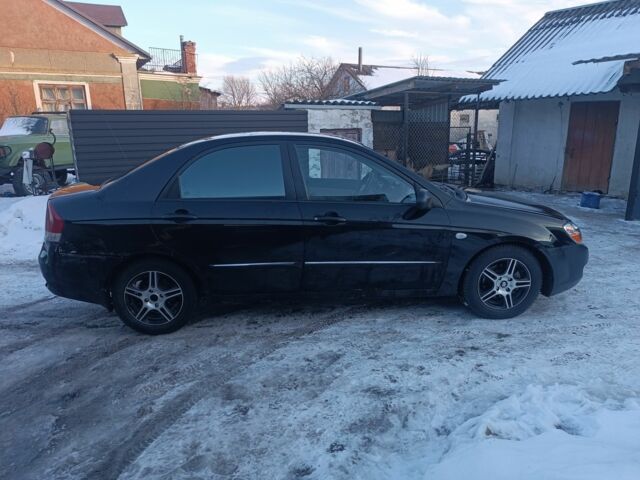 Черный Киа Черато, объемом двигателя 1.6 л и пробегом 360 тыс. км за 2409 $, фото 1 на Automoto.ua