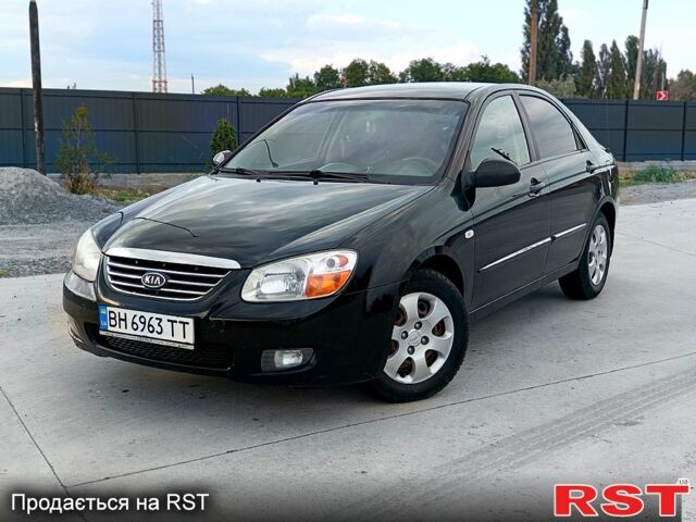 Черный Киа Черато, объемом двигателя 1.6 л и пробегом 210 тыс. км за 4000 $, фото 1 на Automoto.ua