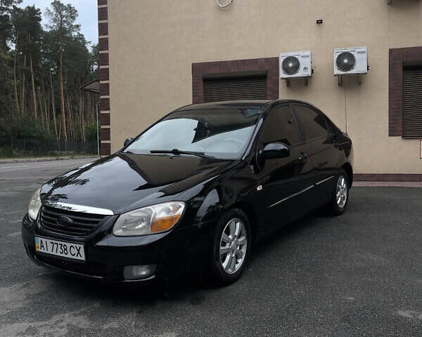 Черный Киа Черато, объемом двигателя 1.59 л и пробегом 273 тыс. км за 2999 $, фото 1 на Automoto.ua