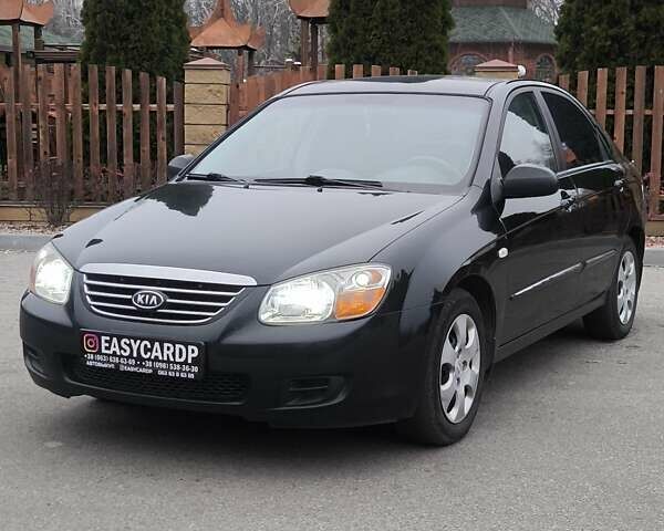 Чорний Кіа Черато, об'ємом двигуна 1.59 л та пробігом 300 тис. км за 4550 $, фото 1 на Automoto.ua