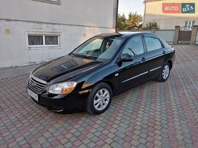 Черный Киа Черато, объемом двигателя 1.6 л и пробегом 208 тыс. км за 3900 $, фото 1 на Automoto.ua
