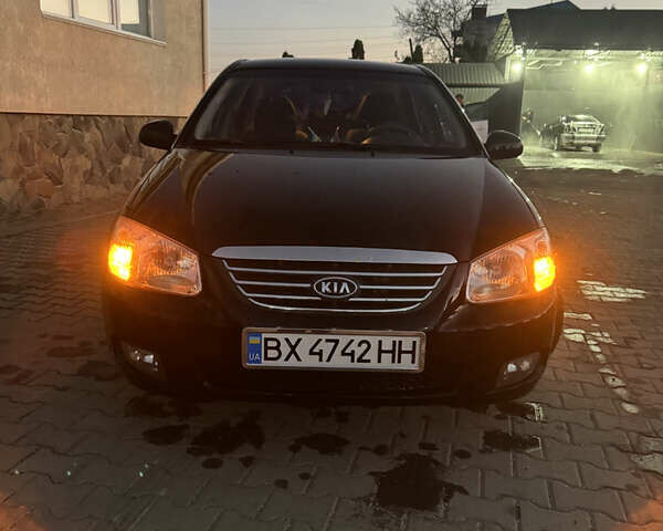 Чорний Кіа Черато, об'ємом двигуна 1.6 л та пробігом 197 тис. км за 5500 $, фото 1 на Automoto.ua