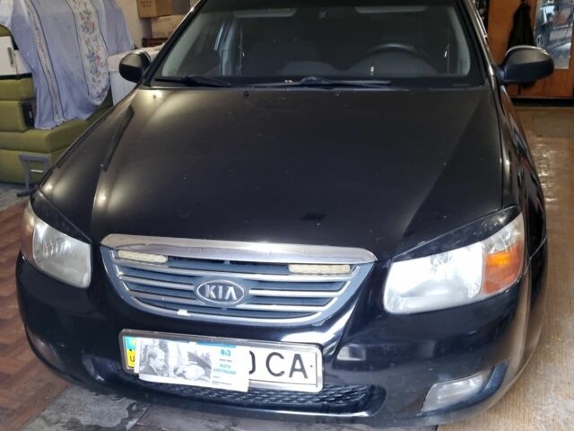 Черный Киа Черато, объемом двигателя 1 л и пробегом 193 тыс. км за 4600 $, фото 1 на Automoto.ua