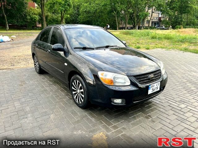 Черный Киа Черато, объемом двигателя 1.6 л и пробегом 187 тыс. км за 4999 $, фото 1 на Automoto.ua