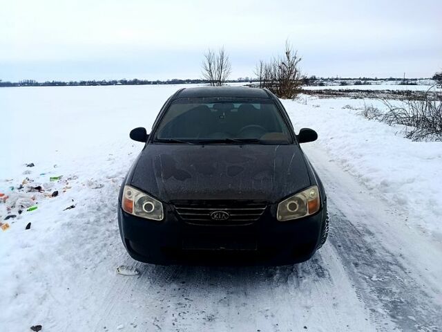 Черный Киа Черато, объемом двигателя 1.6 л и пробегом 25000 тыс. км за 2500 $, фото 1 на Automoto.ua