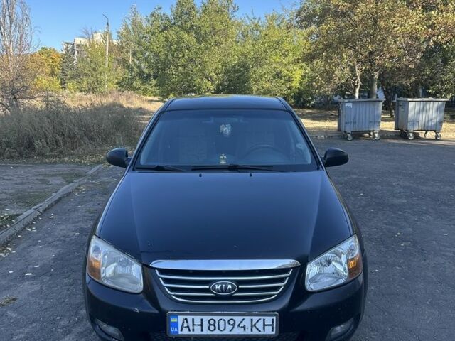 Чорний Кіа Черато, об'ємом двигуна 2 л та пробігом 310 тис. км за 3400 $, фото 1 на Automoto.ua