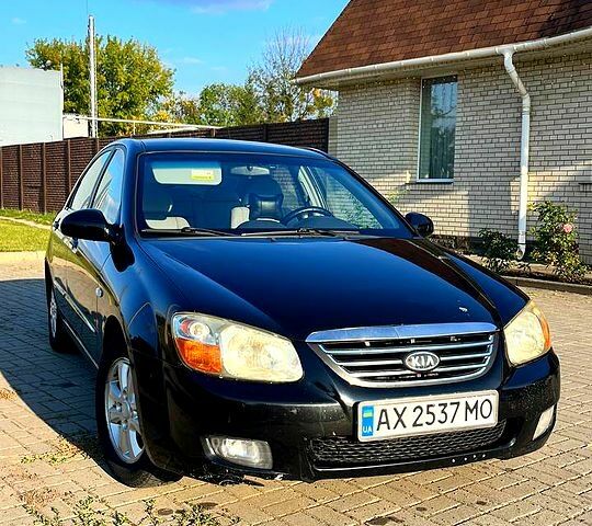 Черный Киа Черато, объемом двигателя 1.6 л и пробегом 199 тыс. км за 4250 $, фото 1 на Automoto.ua
