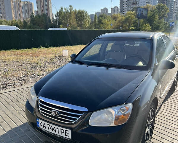 Черный Киа Черато, объемом двигателя 1.98 л и пробегом 256 тыс. км за 3700 $, фото 1 на Automoto.ua