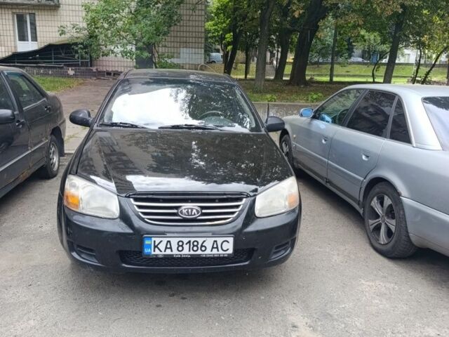 Черный Киа Черато, объемом двигателя 1 л и пробегом 305 тыс. км за 2650 $, фото 1 на Automoto.ua