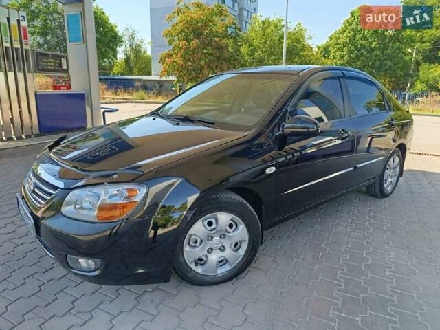 Черный Киа Черато, объемом двигателя 1.59 л и пробегом 219 тыс. км за 4600 $, фото 1 на Automoto.ua