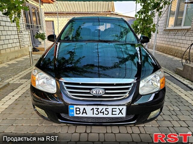 Чорний Кіа Черато, об'ємом двигуна 2 л та пробігом 205 тис. км за 4500 $, фото 1 на Automoto.ua