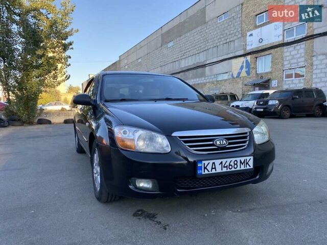Черный Киа Черато, объемом двигателя 1.98 л и пробегом 335 тыс. км за 4100 $, фото 1 на Automoto.ua