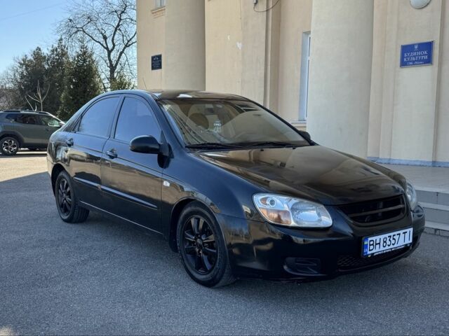 Черный Киа Черато, объемом двигателя 2 л и пробегом 360 тыс. км за 4000 $, фото 1 на Automoto.ua