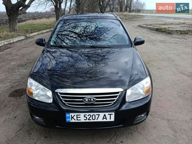 Чорний Кіа Черато, об'ємом двигуна 1.59 л та пробігом 184 тис. км за 4600 $, фото 1 на Automoto.ua