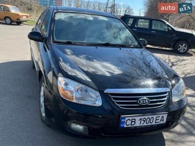 Черный Киа Черато, объемом двигателя 1.6 л и пробегом 165 тыс. км за 4800 $, фото 1 на Automoto.ua