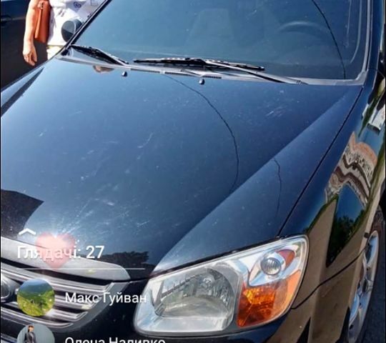 Черный Киа Черато, объемом двигателя 1.6 л и пробегом 207 тыс. км за 5000 $, фото 1 на Automoto.ua