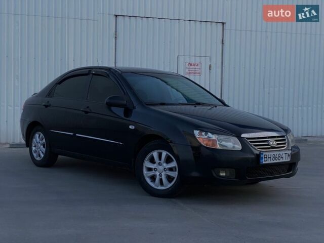 Черный Киа Черато, объемом двигателя 1.6 л и пробегом 230 тыс. км за 3800 $, фото 1 на Automoto.ua