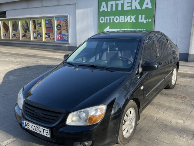 Черный Киа Черато, объемом двигателя 1.6 л и пробегом 260 тыс. км за 4000 $, фото 1 на Automoto.ua
